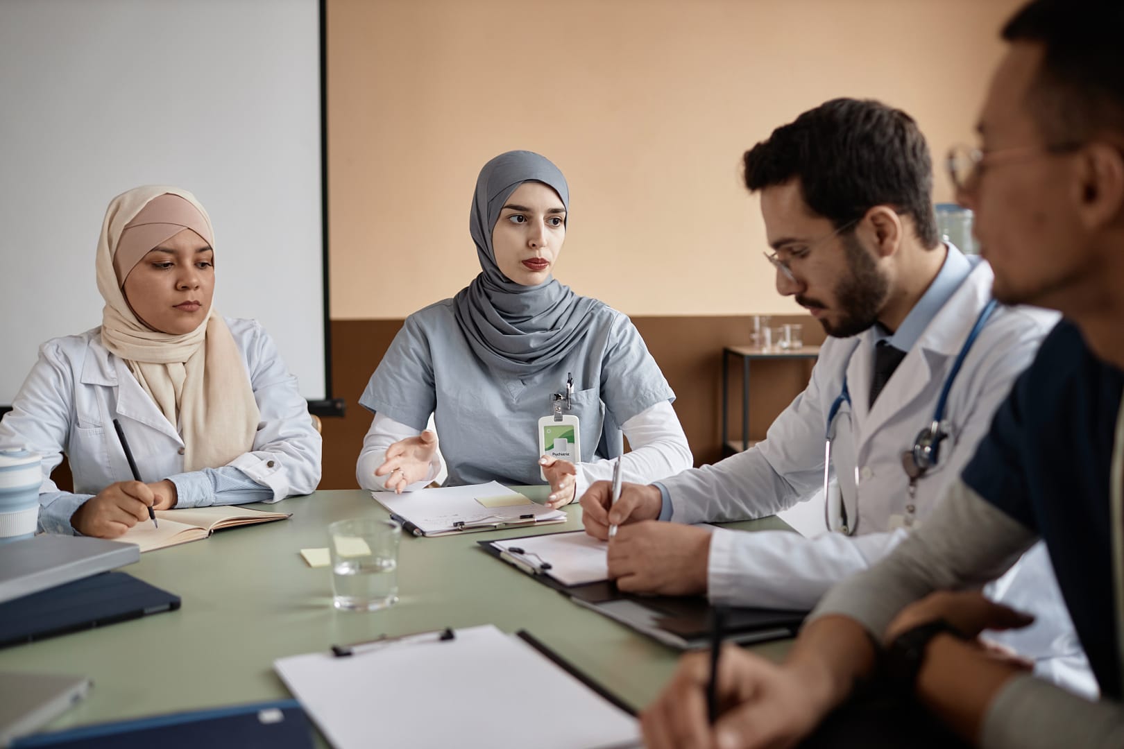 female-medical-specialist-delivering-staff-trainin-2026-03-19-22-05-40-utc